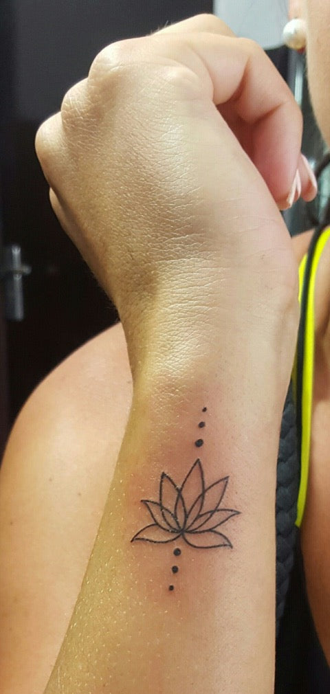 Wrist Lotus Flower Tattoo