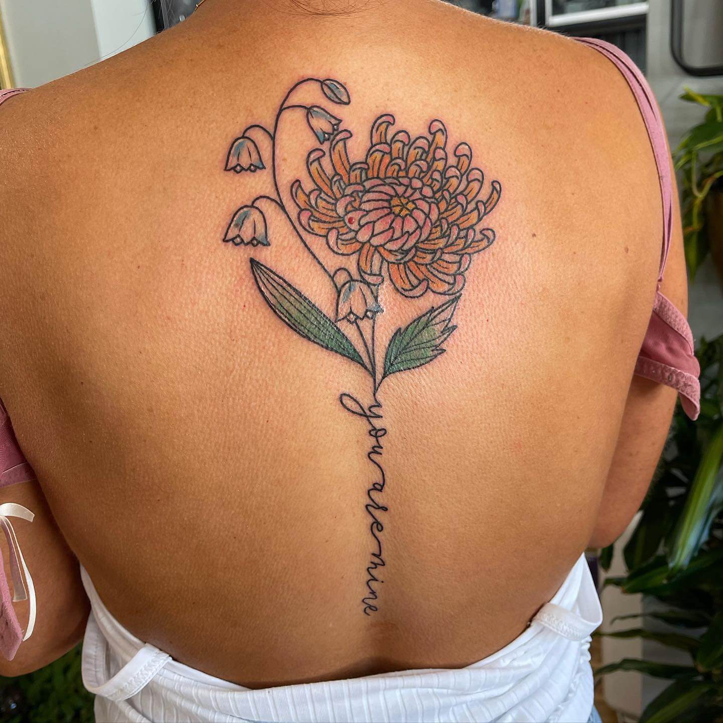 chrysanthemum and lily of the valley tattoo