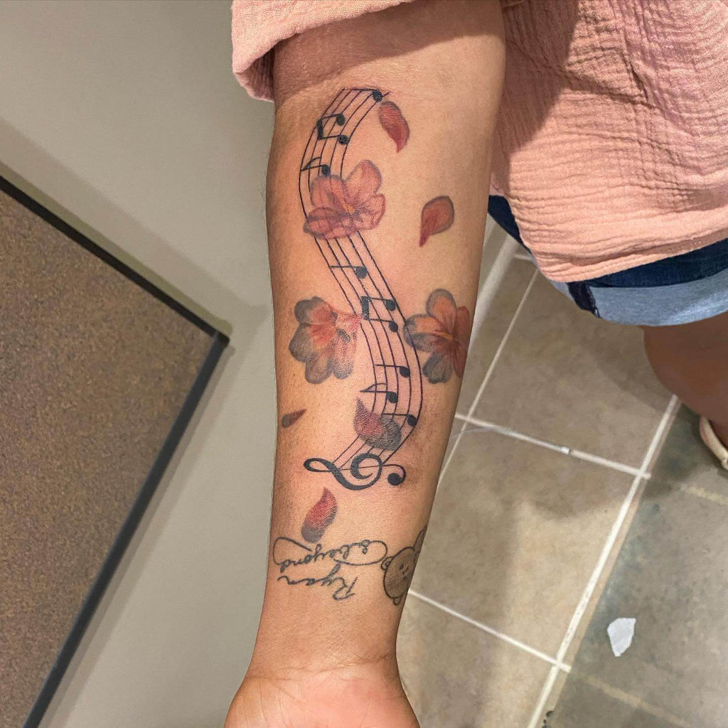 music note flower tattoo