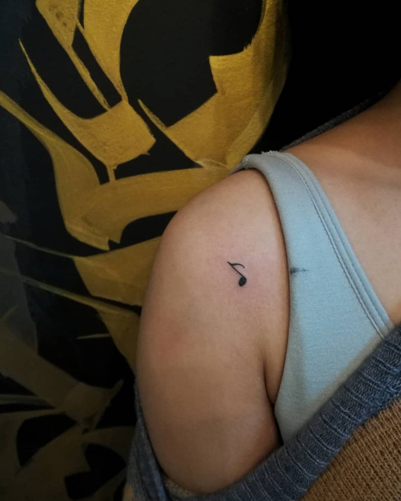 small music note tattoo