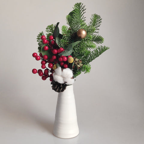 “Berry bouquet with pine cones makes a great flower arrangement”