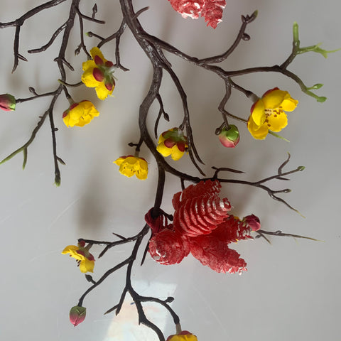 “plum flower branches with pine cones”