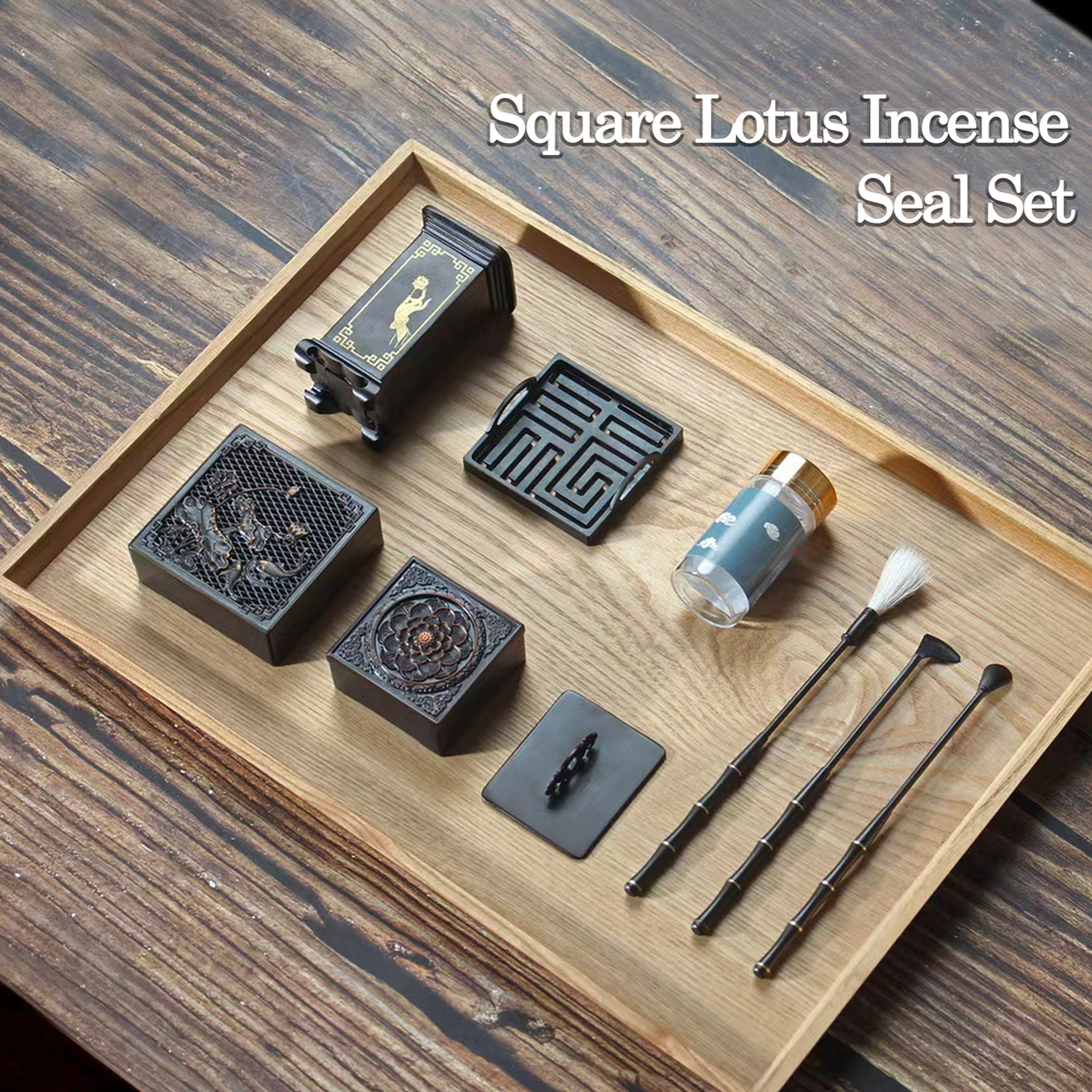 Square lotus incense seal burner set arranged on a wooden tray