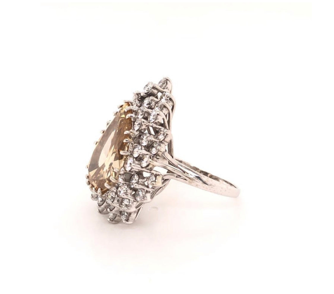 Fancy Yellow Brownish Pear Shape Diamond Ring With Double Halo in  Platinum