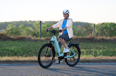 Velo D2 ebike with mint color rided by a smile girl
