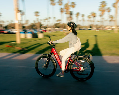 Velotric D2 Ebike riding by a sunshine girl