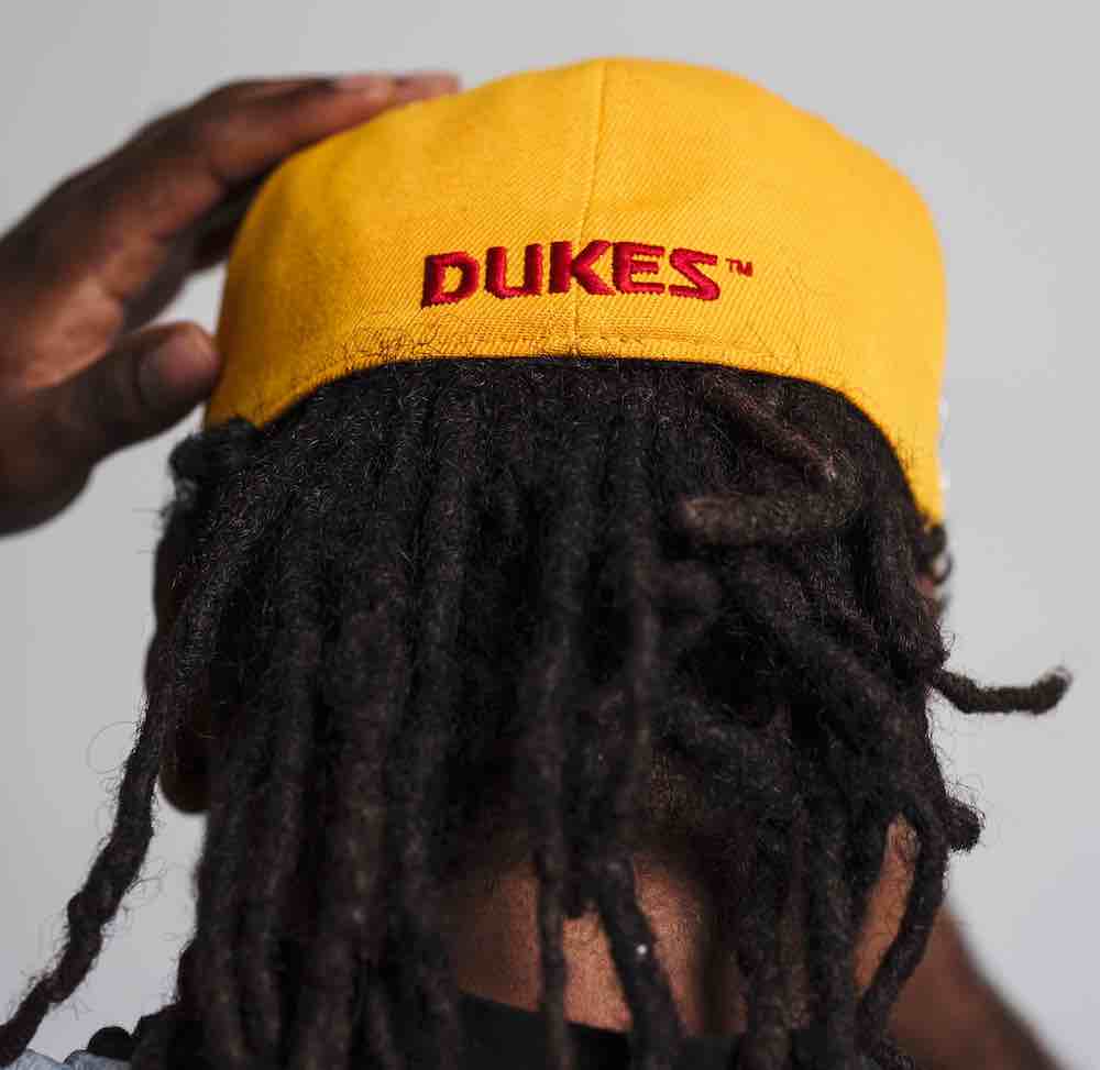 Albuquerque Dukes Gold Red Bill Fitted Dukes 50 Yr. Anniversary logo