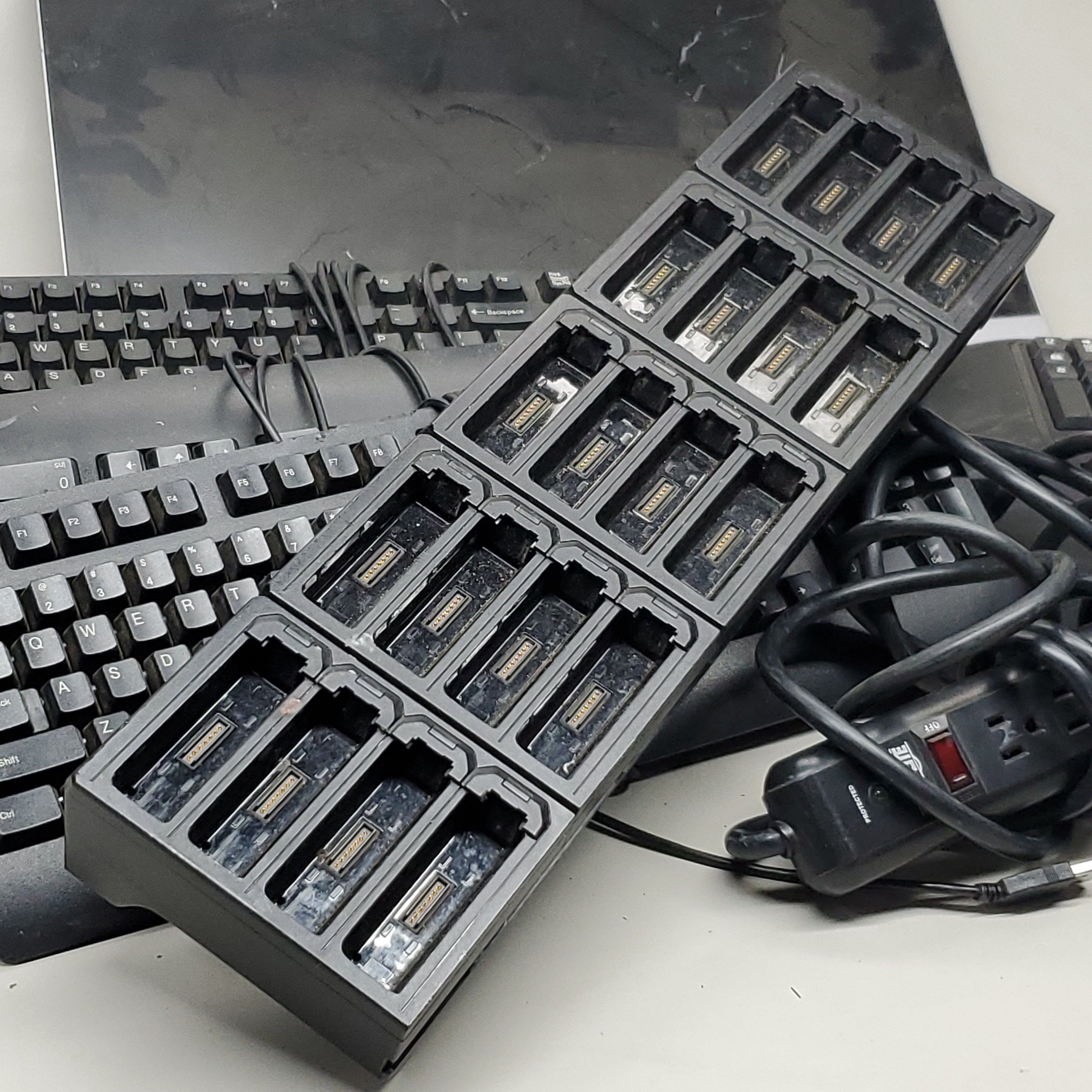 ZA@ Box of Keyboards (6), Monitor (1), Zebra Charge Dock (1) & Surge Protector (1) (Used AS-IS)