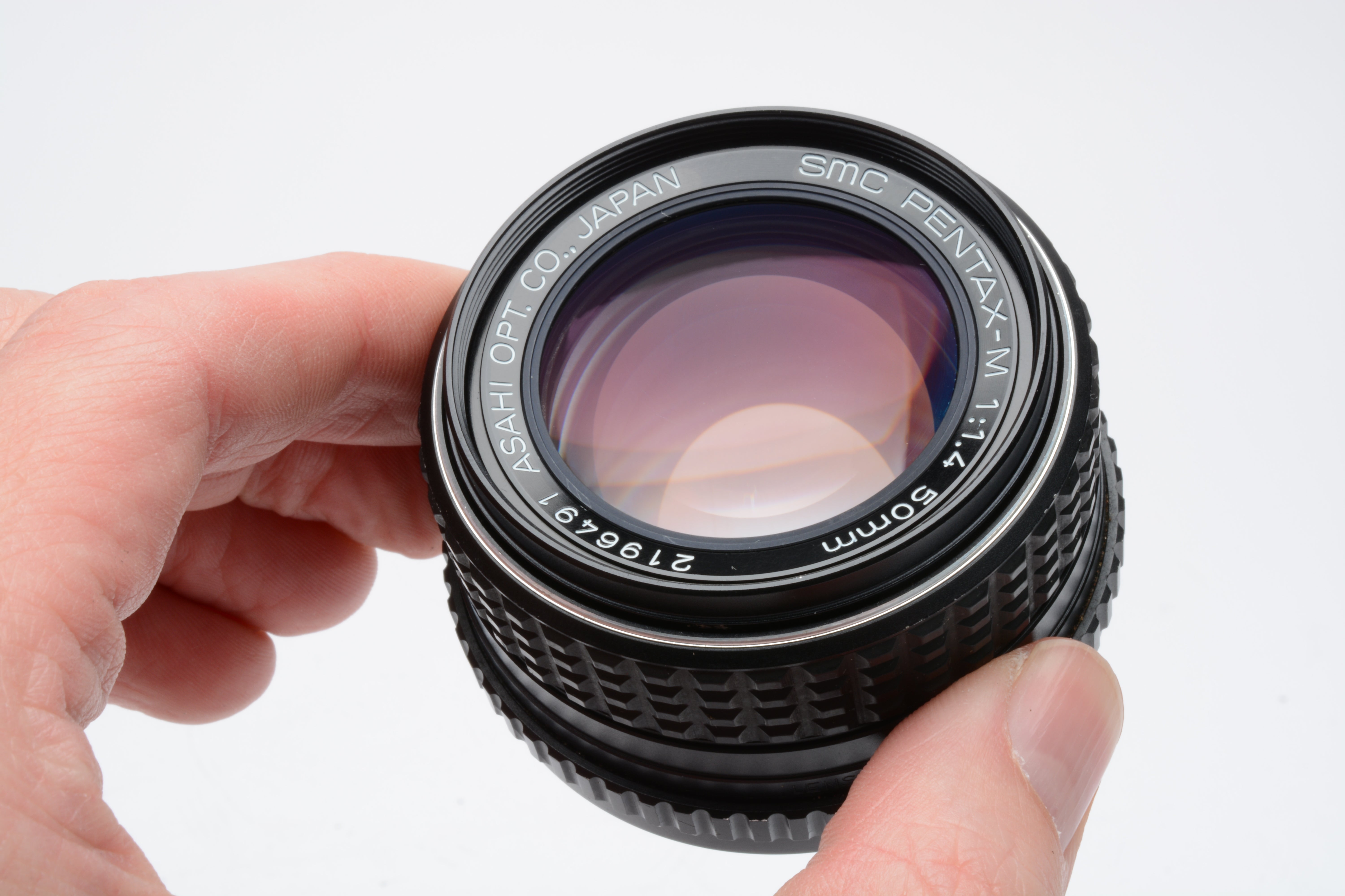Pentax-M SMC 50mm f1.4 prime lens, caps, Skylight filter + case, clean & sharp