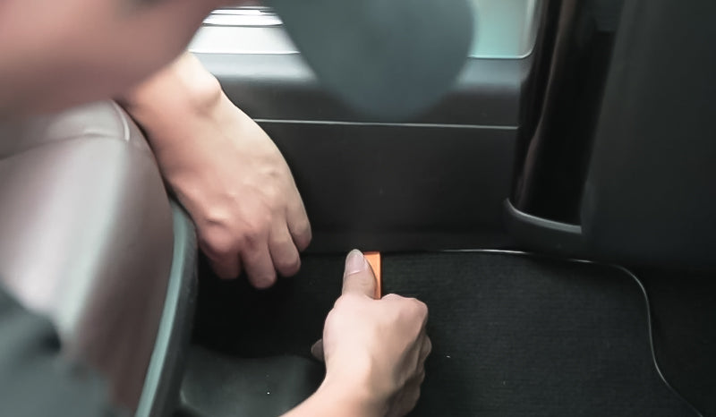 Hide rest of the wire underneath the carpet