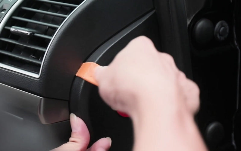 pry tool to pry open the housing on the side of the copilot