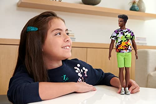Barbie Ken Fashionistas Doll, Broad, Black Curly Hair, Multi-Colored Camo Print Shirt, Neon Green Shorts, Silvery Sneakers, Toy for Kids 3 to 8 Years Old