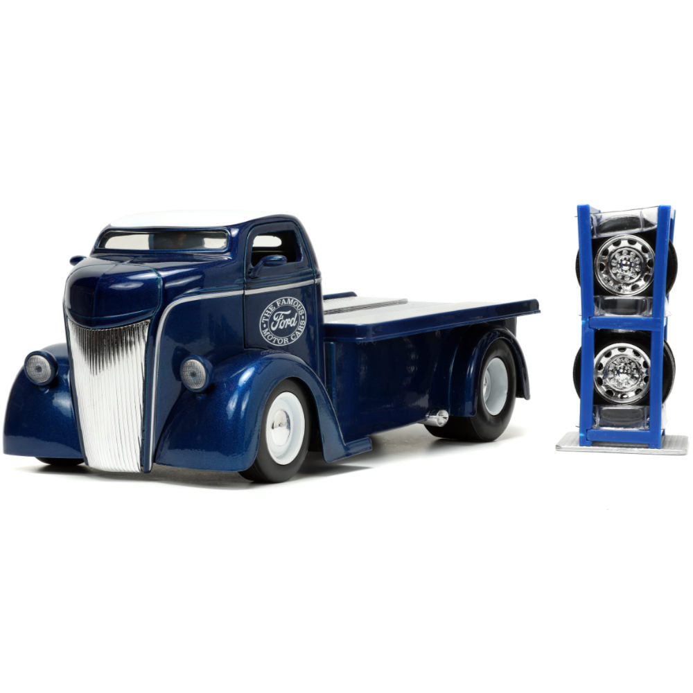 Just Trucks 1947 Ford COE Flatbed Tow Truck with Extra Wheels 1:24 Scale Diecast Model Metallic Blue by Jada 33853