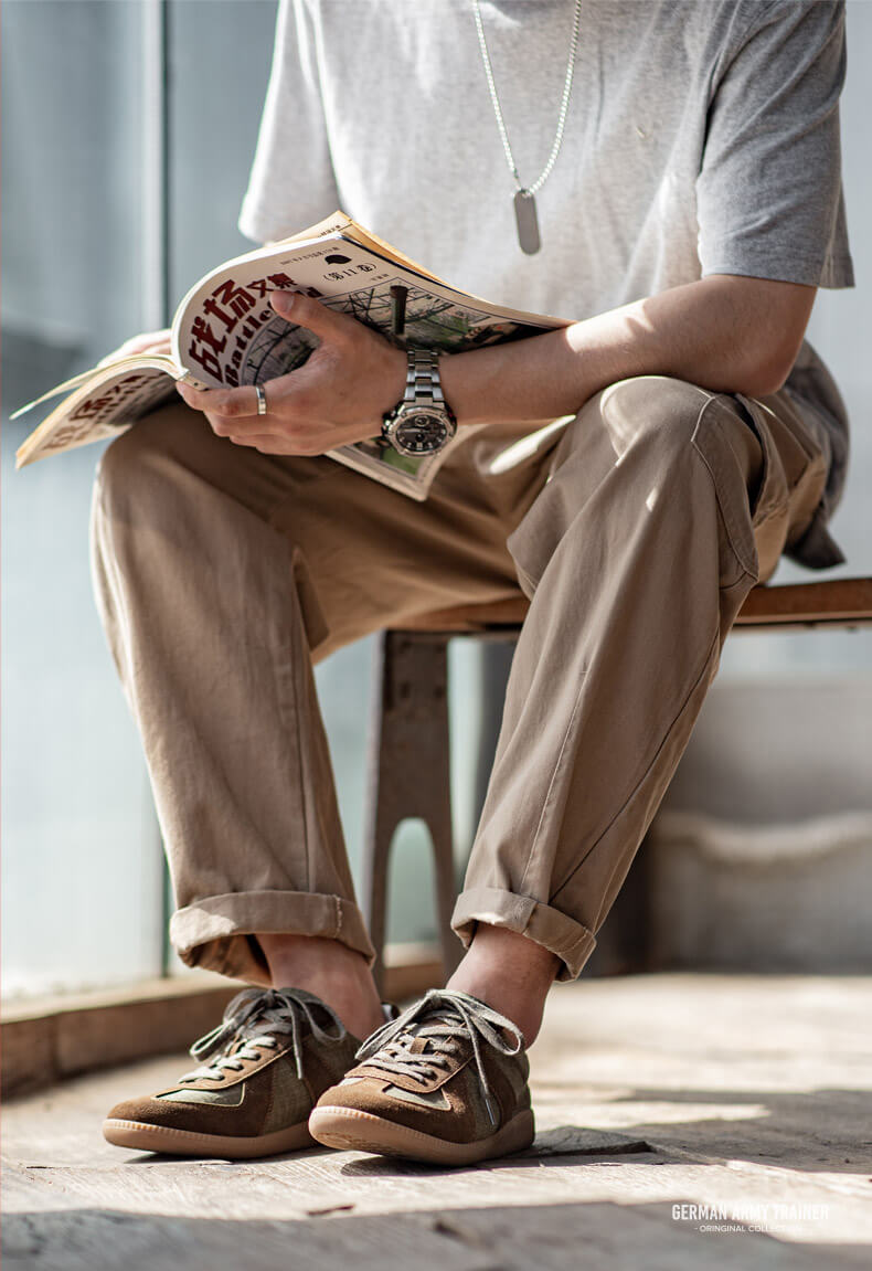 Kalf leer + suede vorm, linnen ademend sneaker terwijl je zorgt voor duurzaamheid, die de retro -vorm benadrukt