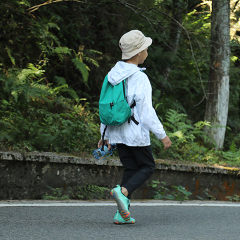 Wearing barefoot shoes for flat feet during everyday walking on outdoor paths