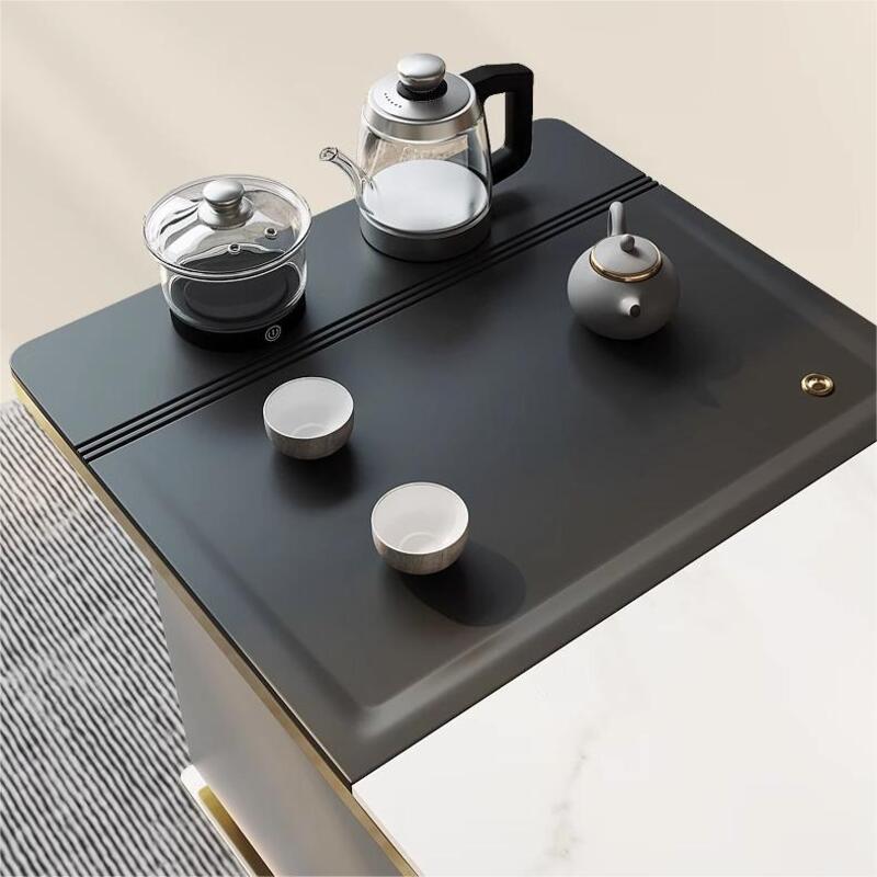 the table top with kettle and cups