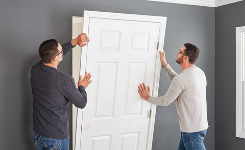 attach the door to the frame