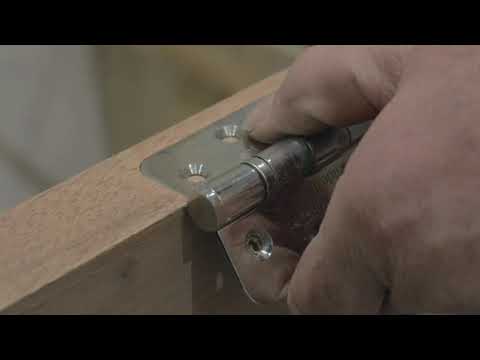 attach the hinges to the door