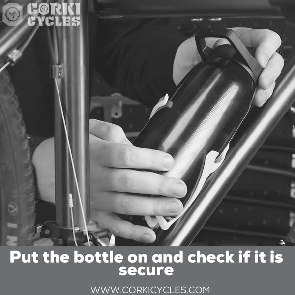 Put water bottle on and check if it is secure - Corki Cycles