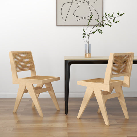 2 Modern Cane Chairs beside a table
