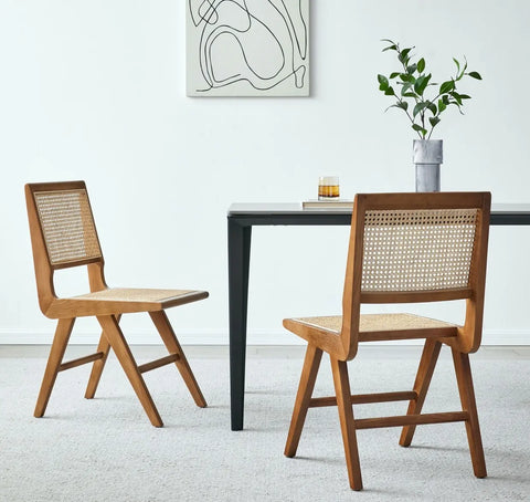 Two Natural Wood Cane Chairs Beside a solid wood end table