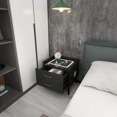 Bedside table and alarm clock