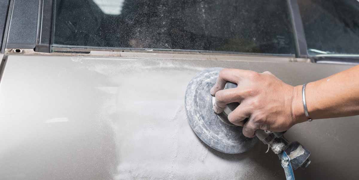 sanding the car with light pressure