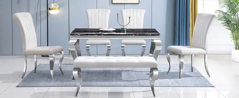 Title: Enhance Your Dining Space with AUZ Beige Velvet Dining Room Chairs in Vertical Texture High Back  Introduction: When it comes to designing your dining space, finding the perfect combination of style, comfort, and durability is essential. AUZ presents its Beige Velvet Dining Room Chairs in Vertical Texture High Back, upholstered with silver mirrored stainless steel legs. This stylishly designed chair not only adds a touch of sophistication to your dining area but also provides a comfortable seating experience. Let's delve deeper into the features that make these chairs an excellent choice for your dining room.  Stylish Design: The AUZ Beige Velvet Dining Room Chairs captivate attention with their impressive design. The combination of beige velvet upholstery and silver metal legs creates a visually striking appearance. The vertical texture and curled backrest add a strong sense of dimension and elegance to the chairs. With their sleek and modern design, these chairs seamlessly blend into any contemporary dining space.  Velvet Upholstery for Comfort: One of the standout features of these dining chairs is the soft cushion made of high-quality velvet and a gentle sponge. This upholstery ensures utmost comfort and support while you enjoy your meals. The plush velvet texture adds a touch of luxury to the dining experience, making it even more enjoyable.  Polished Metal Legs: Built to last, the AUZ Beige Velvet Dining Room Chairs feature exquisite cabriole front legs and slightly bent backward rear legs made of silver mirrored stainless steel. These polished metal legs not only add to the chair's elegance but also provide sturdy support. Their durable construction ensures that these chairs will withstand regular use.  Kitchen & Dining Room Chairs: The AUZ Beige Velvet Dining Room Chairs have a weight capacity of 550 LB, making them suitable for various body types. Whether you're hosting a small gathering or a large dinner party, these chairs can accommodate all your guests' needs. Their modern style and sophisticated design elevate the overall aesthetic of your dining space.  A Perfect Match: To complete the harmonious look, AUZ also offers matching dining room benches in the same style as the dining chairs. This cohesive set ensures that your dining area is visually appealing and cohesive in design. By combining the AUZ Beige Velvet Dining Room Chairs and benches, you create a truly captivating and stylish atmosphere.  Conclusion: If you're seeking dining chairs that are not only visually stunning but also provide optimal comfort and durability, the AUZ Beige Velvet Dining Room Chairs in Vertical Texture High Back are an ideal choice. With their stylish design, velvet upholstery, and polished metal legs, these chairs elevate any dining space, adding a touch of sophistication. Additionally, the matching benches further enhance the overall aesthetic appeal of your dining area. Make a statement in style with AUZ dining chairs and create a dining experience that is both comfortable and visually impressive.