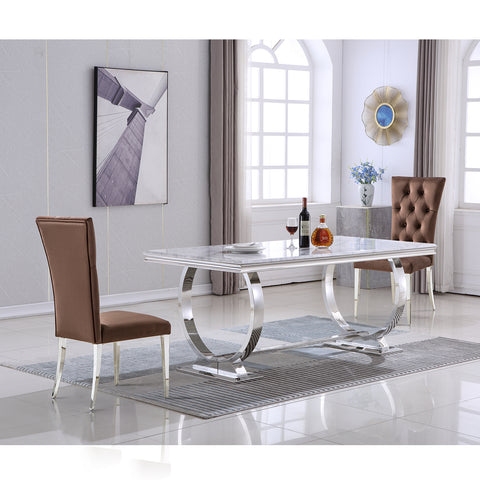 Title: Enhance Your Dining Experience with Brown Velvet Upholstered Chairs Introduction: When it comes to creating an inviting and stylish dining space, choosing the right furniture is essential. Brown velvet upholstered dining room chairs with deep buttons tufted back and silver mirror stainless steel legs are a perfect choice that combines elegance with comfort. In this blog post, we will explore the benefits of these exquisite chairs and how they can elevate your dining area. 1. The Beauty of Brown Velvet: The brown velvet upholstery of these dining room chairs adds a touch of sophistication and luxury to any dining space. The rich and deep color creates an inviting ambiance, making your dining experience truly memorable. Additionally, velvet is known for its soft and plush texture, providing an unparalleled level of comfort while you enjoy your meals. 2. High Backrest for Extra Comfort: One of the standout features of these chairs is their high backrest with deep-button tufted decoration. This design element not only adds a stylish and elegant touch but also ensures optimum comfort and support. The tall backrest allows you to sit back and relax, providing proper lumbar support and minimizing discomfort during long meals or gatherings. 3. Spacious Seat Dimensions: The brown velvet upholstered dining chairs are designed with generous seat dimensions. With a width of 19.3" and depth of 21.3", these chairs offer ample space to accommodate individuals of various sizes comfortably. Whether you are enjoying a casual breakfast or hosting a formal dinner, these spacious seats ensure everyone can relax and enjoy their meal without feeling constrained. 4. Stunning Silver Mirror Stainless Steel Legs: The metallic silver mirror finish of the stainless steel legs adds a modern and glamorous touch to the overall design of the chairs. These polished legs create a reflective surface that complements the surrounding decor beautifully, especially when lit by ambient lighting. The interplay of light and metal adds a sophisticated flair, making these chairs a focal point in your dining area. Conclusion: Investing in brown velvet upholstered dining room chairs with deep buttons tufted back and silver mirror stainless steel legs is a surefire way to elevate the aesthetics and comfort of your dining area. These chairs not only offer luxurious seating but also enhance the overall ambiance with their elegant design elements. Be prepared to impress your guests and make every meal a truly remarkable experience with these exquisite chairs.