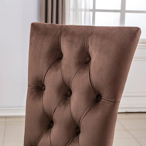 Title: Enhance Your Dining Experience with Brown Velvet Upholstered Chairs Introduction: When it comes to creating an inviting and stylish dining space, choosing the right furniture is essential. Brown velvet upholstered dining room chairs with deep buttons tufted back and silver mirror stainless steel legs are a perfect choice that combines elegance with comfort. In this blog post, we will explore the benefits of these exquisite chairs and how they can elevate your dining area. 1. The Beauty of Brown Velvet: The brown velvet upholstery of these dining room chairs adds a touch of sophistication and luxury to any dining space. The rich and deep color creates an inviting ambiance, making your dining experience truly memorable. Additionally, velvet is known for its soft and plush texture, providing an unparalleled level of comfort while you enjoy your meals. 2. High Backrest for Extra Comfort: One of the standout features of these chairs is their high backrest with deep-button tufted decoration. This design element not only adds a stylish and elegant touch but also ensures optimum comfort and support. The tall backrest allows you to sit back and relax, providing proper lumbar support and minimizing discomfort during long meals or gatherings. 3. Spacious Seat Dimensions: The brown velvet upholstered dining chairs are designed with generous seat dimensions. With a width of 19.3" and depth of 21.3", these chairs offer ample space to accommodate individuals of various sizes comfortably. Whether you are enjoying a casual breakfast or hosting a formal dinner, these spacious seats ensure everyone can relax and enjoy their meal without feeling constrained. 4. Stunning Silver Mirror Stainless Steel Legs: The metallic silver mirror finish of the stainless steel legs adds a modern and glamorous touch to the overall design of the chairs. These polished legs create a reflective surface that complements the surrounding decor beautifully, especially when lit by ambient lighting. The interplay of light and metal adds a sophisticated flair, making these chairs a focal point in your dining area. Conclusion: Investing in brown velvet upholstered dining room chairs with deep buttons tufted back and silver mirror stainless steel legs is a surefire way to elevate the aesthetics and comfort of your dining area. These chairs not only offer luxurious seating but also enhance the overall ambiance with their elegant design elements. Be prepared to impress your guests and make every meal a truly remarkable experience with these exquisite chairs.