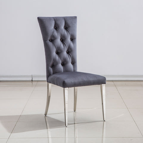 Title: Elevate Your Dining Experience with Grey Velvet Upholstered Chairs Introduction: When it comes to creating a stylish and inviting dining area, the right furniture plays a crucial role. Grey velvet upholstered dining room chairs with button-tufted back and silver stainless steel legs are an excellent choice to add a touch of luxury and comfort to your dining space. In this blog post, we will explore the benefits of these elegant chairs and how they can enhance your dining experience. 1. Exquisite and Luxurious Appearance: The craftsmanship on the upholstery and button-tufted back gives these dining chairs a luxurious and elegant look. The concise and vogue lines add a sense of sophistication to your dining area, making it visually appealing. The exquisite design and beautiful grey velvet upholstery elevate the overall aesthetics of the space, creating a stylish and refined ambiance. 2. High Backrest for Enhanced Comfort: These dining chairs are designed with a high backrest, providing excellent support and comfort during meals. The generous backrest not only offers a comfortable seating experience but also promotes good posture. Whether you are enjoying a leisurely dinner or engaging in lively conversations with family and friends, the high backrest ensures that you can sit back and relax in utmost comfort. 3. Gorgeous Silver Stainless Steel Legs: The silver stainless steel legs of these chairs are polished and have a mirror-like finish. This adds a modern and glamorous touch to the design, especially when illuminated by ambient lighting. The interplay of light and the polished metal legs creates a stunning visual effect, making these chairs a focal point in your dining area. Additionally, the stainless steel construction ensures sturdiness and durability, with a weight-bearing capacity of at least 550 lbs. 4. Cozy and Generous Seating: These grey velvet upholstered dining chairs not only provide a sense of hierarchy to your home decoration but also offer generous seating space. The high-quality lining and richly foam-padded seat and back ensure maximum comfort. The high elasticity of the padding provides a cushioning effect, allowing you to sit comfortably for extended periods. The easy-care brown tufted upholstery adds to the overall elegance while being practical and easy to clean. Conclusion: Incorporating grey velvet upholstered dining room chairs with button tufted back and silver stainless steel legs can transform your dining area into a luxurious and inviting space. These chairs offer a perfect blend of style and comfort, with their elegant appearance and high backrest providing optimum support. The mirror-like finish of the silver stainless steel legs adds a touch of modernity, making these chairs a visual delight in any lighting condition. Elevate your dining experience and create lasting memories with these exquisite grey velvet dining chairs.