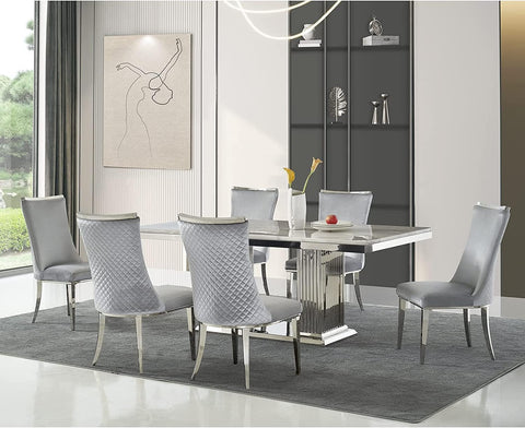 Title: Elevate Your Dining Space with Light Grey Velvet Dining Chairs  Introduction: Adding a touch of elegance and sophistication to your dining space is now possible with the Light Grey Velvet Dining Chairs. These stylish chairs boast a combination of silver grey gloss velvet upholstery and silver mirror metal legs, creating a modern and futuristic aesthetic. Not only do they enhance the visual appeal of your dining area, but they also provide ample comfort and support for a truly enjoyable dining experience.  Benefits of Light Grey Velvet Dining Chairs:  1. Stylish and Contemporary Design: The silver grey gloss velvet upholstery combined with the silver mirror metal legs gives these chairs a sleek and sophisticated look. This modern and future-oriented design creates a sense of openness, making your dining space appear bigger and brighter.  2. Eye-Catching Backrest Design: The unique diamond-shaped texture and the silver top decorated back of these chairs make them a captivating artwork in your room. The intricate detailing not only adds visual interest but also serves as a focal point, attracting the attention of your guests.  3. Comfort and Durability: The dining chairs feature a stable stainless steel frame, ensuring durability and longevity. The high-quality sponge filling provides a comfortable seating experience, allowing you and your guests to relax and enjoy your meals without any discomfort. With a weight capacity of 550 lbs, these chairs are sturdy and suitable for various body types.  Matching Suggestions:  1. Neutral and Versatile: The light grey velvet upholstery of these dining chairs allows for effortless integration into various interior styles. Whether your dining space follows a contemporary, modern, or even minimalist aesthetic, these chairs will seamlessly blend in and complement your existing decor.  2. Monochromatic Elegance: Create a sophisticated and cohesive look by pairing the light grey velvet dining chairs with a sleek and minimalist dining table in silver or white. This monochromatic color scheme gives your dining space a timeless and elegant appeal.  3. Bold Accents: If you prefer a more eclectic and vibrant dining area, consider adding bold accents through accessories or other furniture pieces. For example, pairing the light grey velvet chairs with a vibrant colored table or bold patterned curtains can create a visually striking and unique dining space.  Conclusion:  The Light Grey Velvet Dining Chairs offer both style and comfort, elevating your dining space to new heights. With their silver grey gloss velvet upholstery, silver mirror metal legs, and eye-catching backrest design, these chairs serve as an artwork in your room while providing a comfortable seating experience. Whether your interior style is contemporary, modern, or eclectic, these chairs seamlessly blend in and add a touch of elegance. Invest in the Light Grey Velvet Dining Chairs to transform your dining space into a sophisticated and inviting area for memorable meals and gatherings.