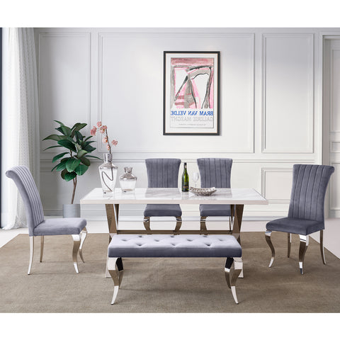 Title: Elevate Your Dining Space with Gray Velvet Dining Chairs Introduction: In the world of interior design, the right choice of dining chairs can transform a dining space from ordinary to extraordinary. If you're looking to add a touch of elegance and sophistication to your dining area, the AUZ Gray Velvet Dining Chairs with Silver Mirrored Stainless Steel Legs are a perfect choice. In this blog post, we will explore the advantages of these exquisite chairs and provide some suggestions on how to style them in your home. Impressive and Stylish Design: The first notable advantage of these gray velvet dining chairs is their impressive and stylish design. The combination of the soft gray velvet upholstery and the sleek silver metal legs creates a visually striking impression. The vertical texture and curled backrest add a sense of dimension and sophistication to the chairs, making them a focal point in any dining space. Comfortable and Supportive Upholstery: Apart from their aesthetic appeal, these chairs also offer exceptional comfort and support. The velvet upholstery combined with the gentle sponge cushioning provides a soft and cozy seating experience. The curved backrest not only enhances the visual appeal but also provides adequate support for your back during meals. You and your guests can enjoy long conversations and delightful meals without any discomfort. Durable and Elegant Construction: The AUZ Gray Velvet Dining Chairs are not only stylish but also built to last. The exquisite cabriole front legs and slightly bent backward rear legs showcase both durability and elegance. The polished silver mirrored stainless steel legs not only provide sturdy support but also add a touch of modern sophistication to your dining space. The combination of these design elements creates a chair that is both functional and visually appealing. Versatile and Styling Suggestions: 1. Monochromatic Elegance: Create an elegant and sophisticated dining space by pairing these gray velvet chairs with a marble or glass dining table. Keep the color palette monochromatic by incorporating silver or metallic accents in the tableware and decor. Add subtle pops of color with fresh flowers or vibrant table linens for a tasteful touch. 2. Modern Chic: Embrace a modern and chic dining aesthetic by pairing these gray velvet chairs with a sleek, minimalist dining table. Opt for a white or light-colored table and keep the decor clean and streamlined. Add geometric-shaped pendant lights and abstract artwork on the walls to create a trendy and fashionable space. 3. Cozy and Warm: If you prefer a cozy and warm atmosphere, pair these gray velvet chairs with a rustic wooden dining table. Incorporate earth tones and natural textures in the table linens and accessories. Add a touch of warmth with soft lighting, such as candlelight or warm-toned pendant lights, to create an inviting ambiance. Conclusion: The AUZ Gray Velvet Dining Chairs with Silver Mirrored Stainless Steel Legs offer a perfect balance of style, comfort, and durability. Their impressive design, comfortable upholstery, and elegant construction make them an excellent addition to any dining space. Whether you prefer an elegant and sophisticated look or a modern and chic aesthetic, these gray velvet chairs are versatile enough to complement a range of interior design styles. Elevate your dining experience by incorporating these exquisite chairs and create a space that exudes elegance and comfort.