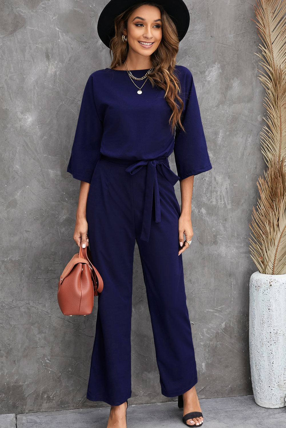 Shop Our Belted Three-Quarter Sleeve Jumpsuit | Chic And Stylish