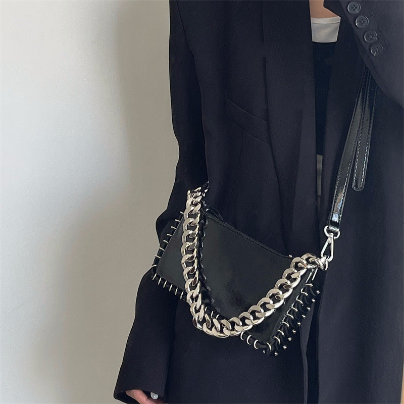 Woman Puck Black Shoulder Bag with Chains and Rings