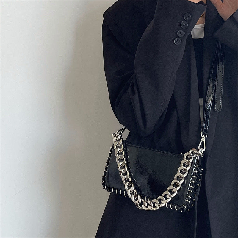 Woman Puck Black Shoulder Bag with Chains and Rings