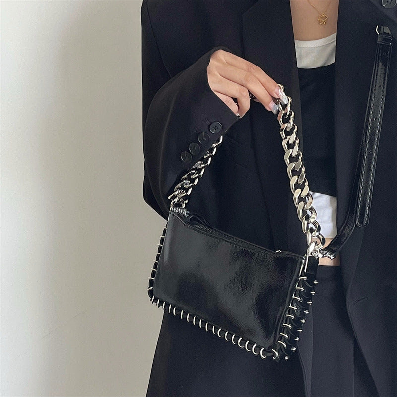 Woman Puck Black Shoulder Bag with Chains and Rings