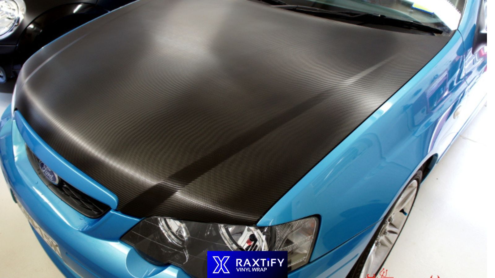 Why do drivers choose to wrap their hoods in carbon fiber films?