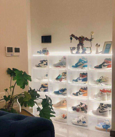 Retailer-friendly branded acrylic shoe boxes with subtle logo imprints.