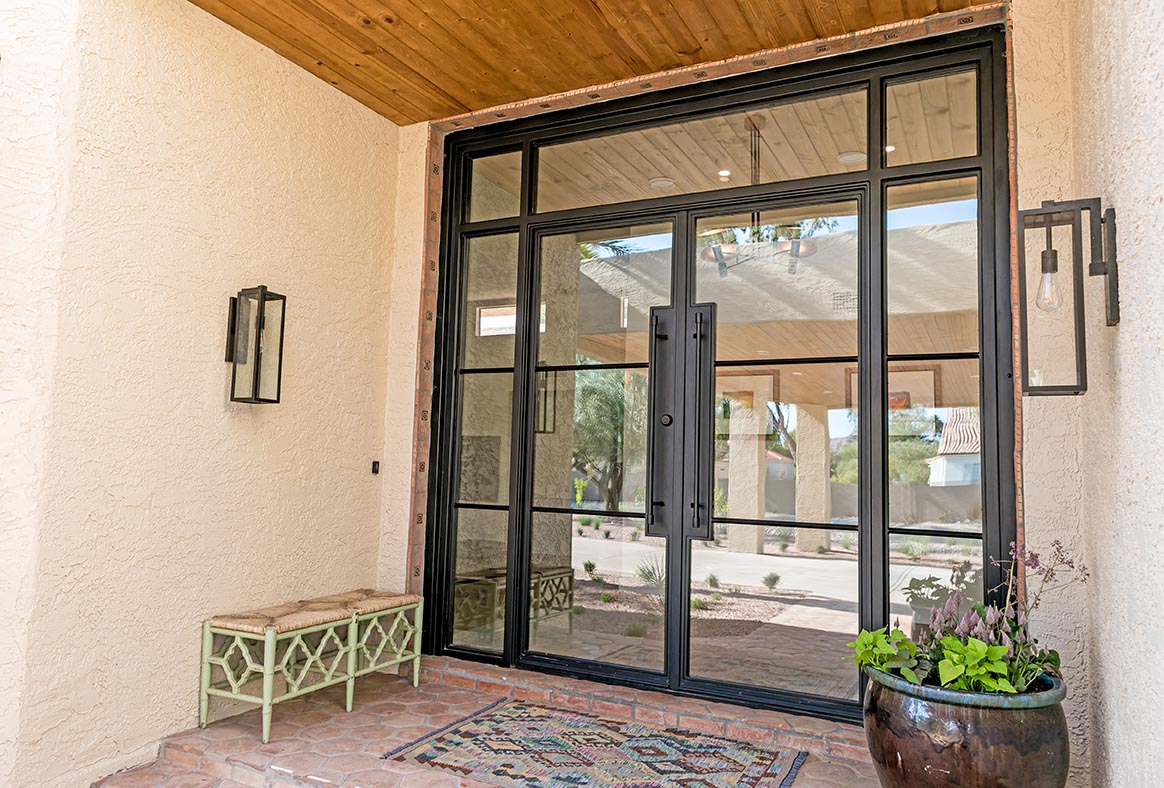wrought iron front french double doors with double pane glass