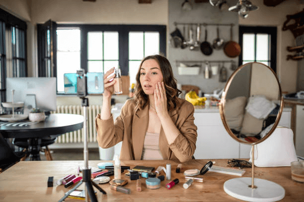a stay at home mom is sharing liquid foundation through social media