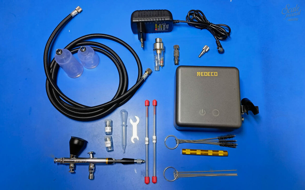 Neoeco Airbrush with compressor, plastic cups,needles, nozzles, air hose, cleaning kit and so on.