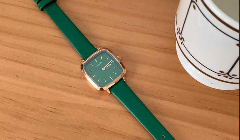 Close-up of Little Green Quartz Women's Watch dial and case finishing