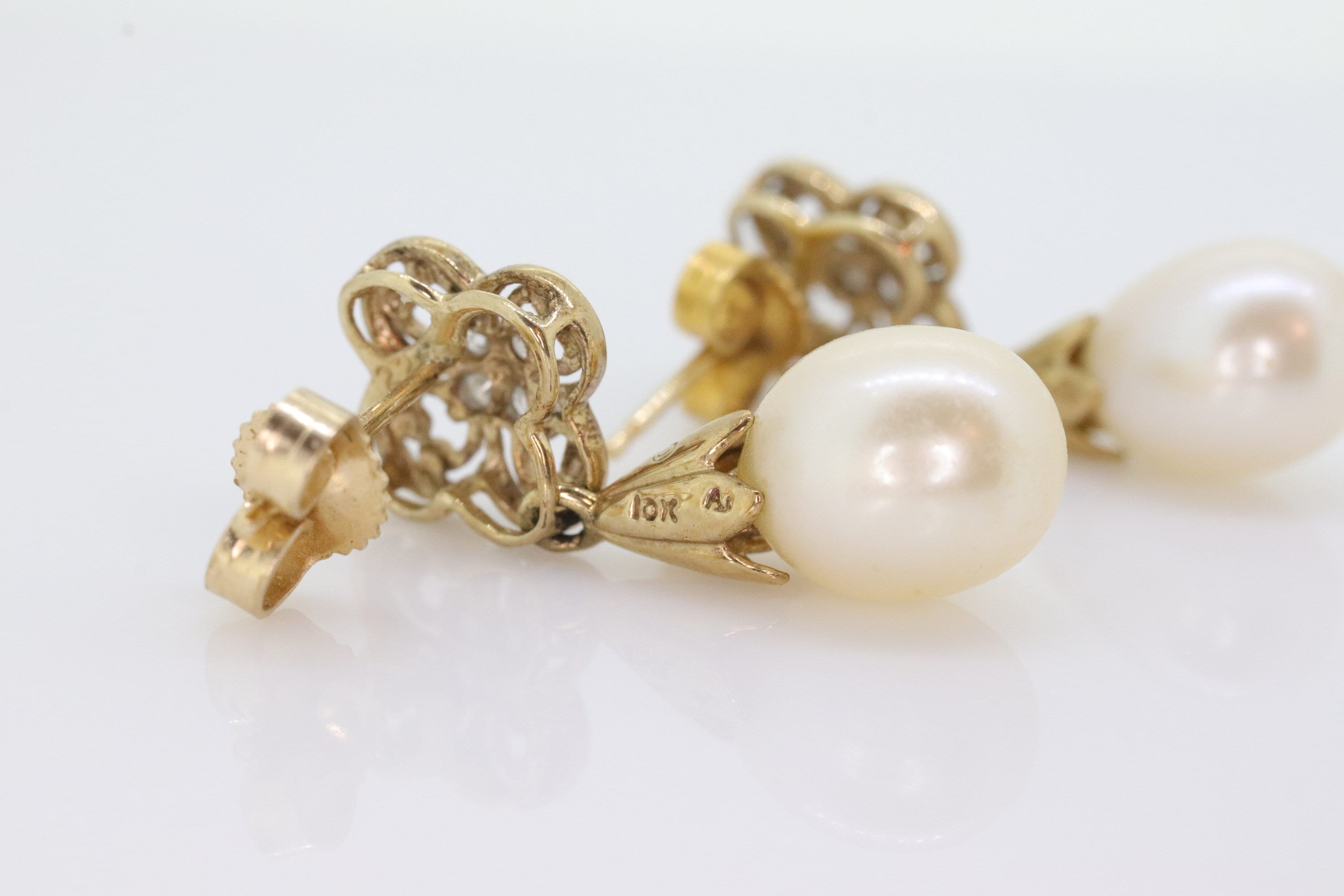 10k Pearl and Diamond earrings. Elegant and Dainty Pearl diamond dangle stud earrings. st(77/11)