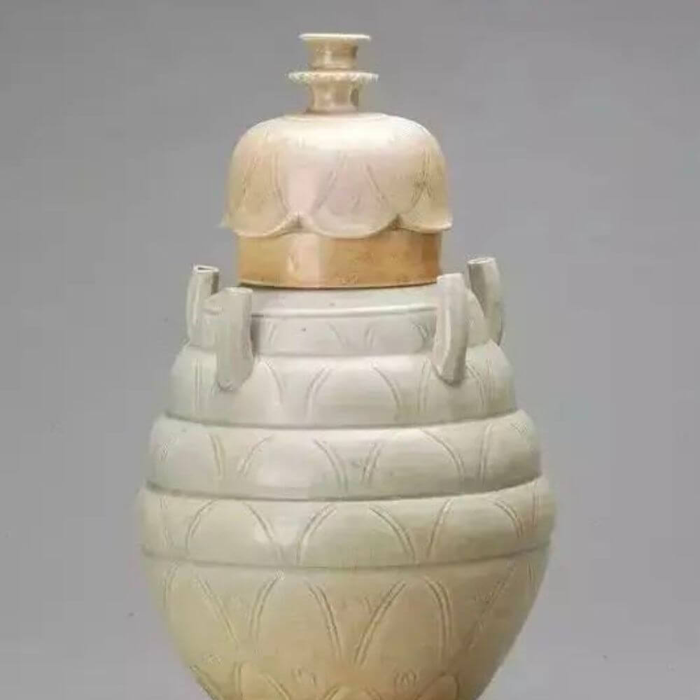 Early Northern Song Dynasty Longquan kiln light green glaze five-tube bottle