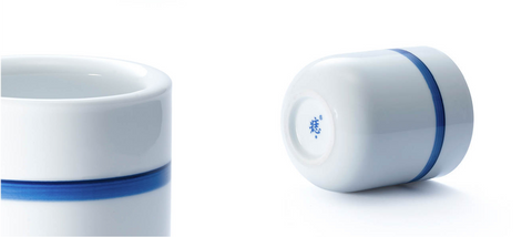 Insulated white porcelain cup with blue circle