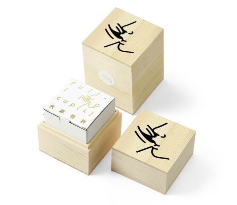 Insulated white porcelain cup in wooden box