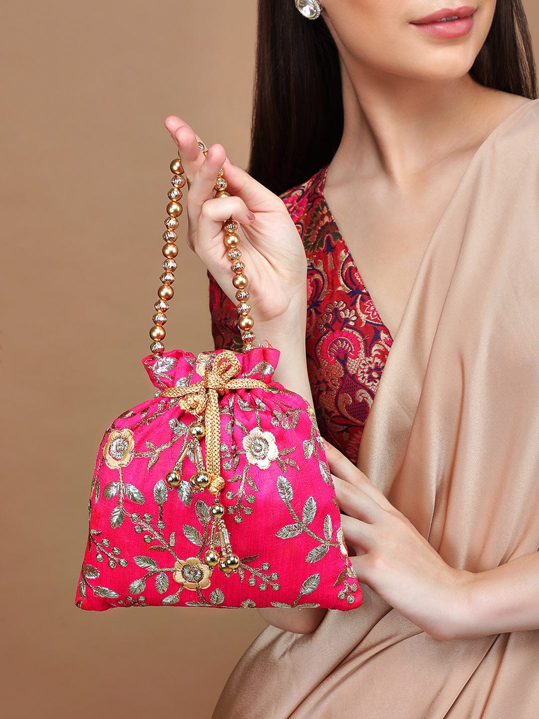 Rubans Pink Coloured Potli Bag With Golden Embroidery And Beads