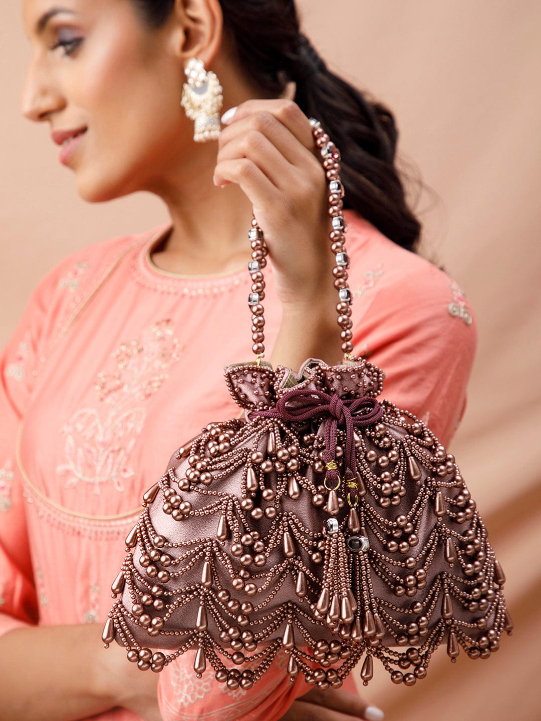 Rubans Potli Bag With Embroided Design Of Pearls.