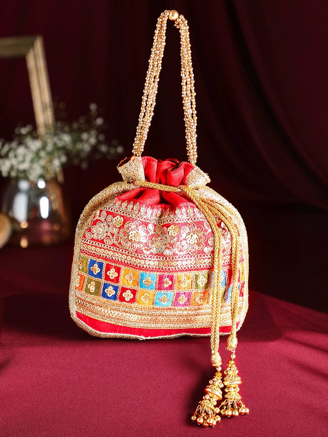 Rubans Red Coloured Potli Bag With Multicoloured And Golden Embroidery